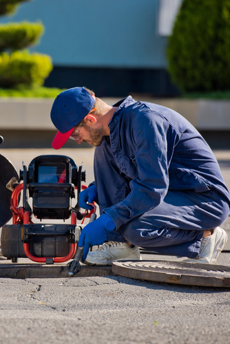 The,Plumber,With,Portable,Camera,For,Pipe,Inspection,And,Other